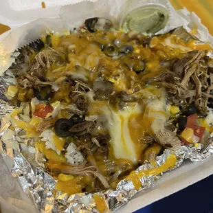 Toston platter with shredded pork to go. Tasty!