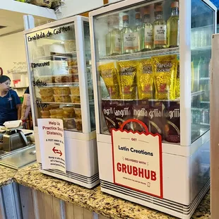 a counter with a variety of food items