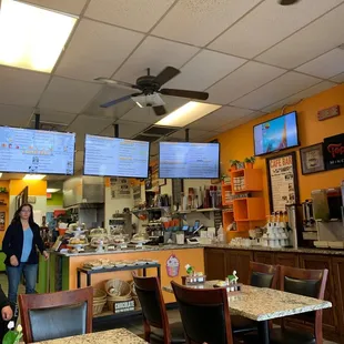 a woman and a man in a restaurant