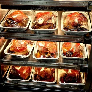 a display of meats in trays