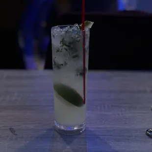  cocktail with a lime garnish