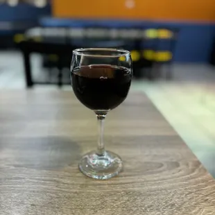  glass of wine on a table