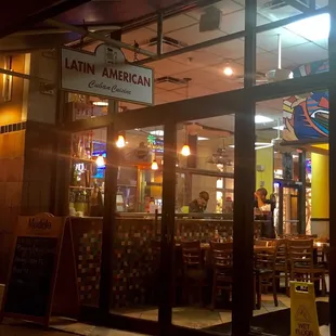 the outside of a restaurant at night