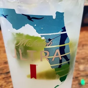 a glass of water with ice