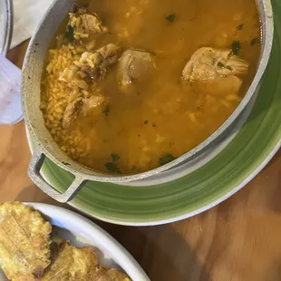 Asopao de Pollo / Chicken Soup - huge portion, quite tasty, but expensive for mostly rice and broth with a few chunks of chicken