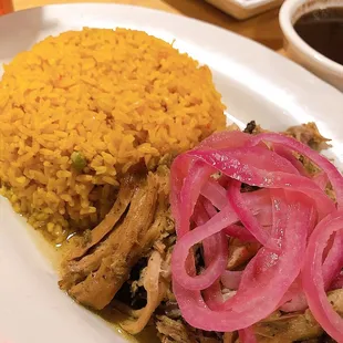 Roasted pork with yellow rice