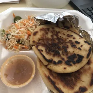 a plate of food and a laptop