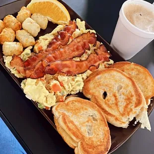 Scrambled Scramble Eggs, tater tots, buttery bread, Cafe Con Leche