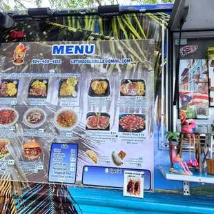 a menu on a food truck