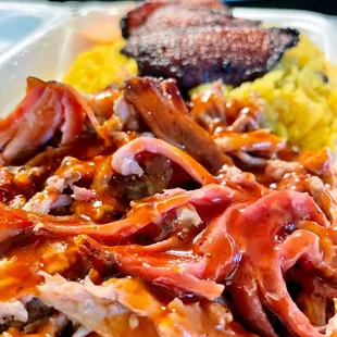 a plate of meat and rice