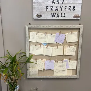 a bulletin board with prayers and prayers written on it