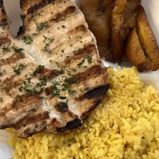 Grilled chicken with yellow rice and plantains