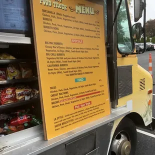 a menu on the side of the truck