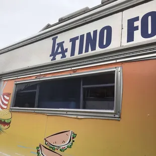 a taco truck parked in a parking lot