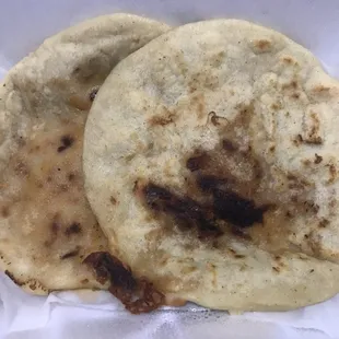 Pupusas filled with beans, cheese &amp; pork