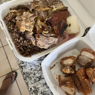 Pork Chicharron, dominican rice, yuca with red onions and pernil
