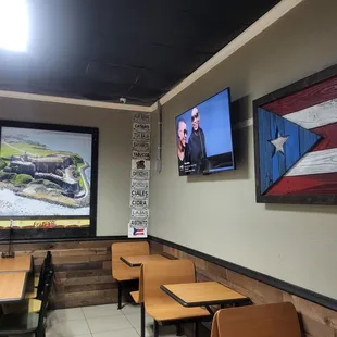 tables and televisions in a restaurant