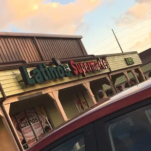 a car parked in front of the store