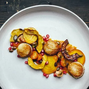 Fall dish of lemongrass butternut puree, scallops, and fall produce