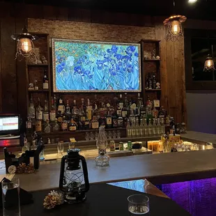 a bar with bottles of alcohol