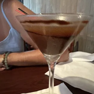 Chocolate martini, not made well the chocolate liquor all at the bottom and the alcohol floating on top.