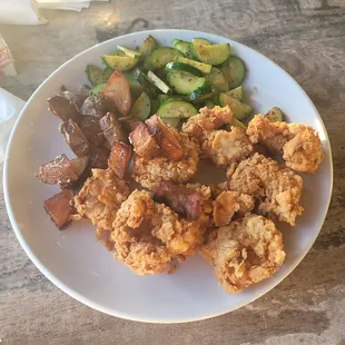 Fried shrimp with sautéed zucchini