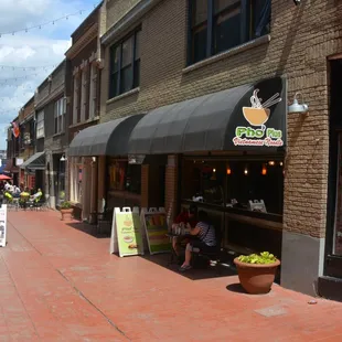 Entrance to Brevard Court coming out the door of Latta Arcade
