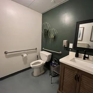 Single restroom, clean, also has a baby changing table
