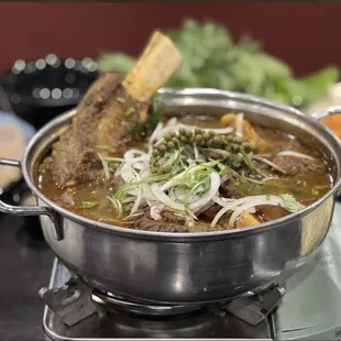 a pot of stew on a stove
