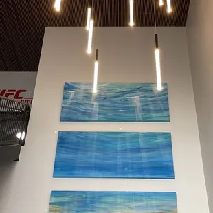 Nice art &amp; modern lights in hall