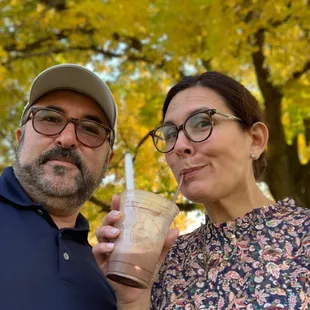 a man and woman taking a selfie