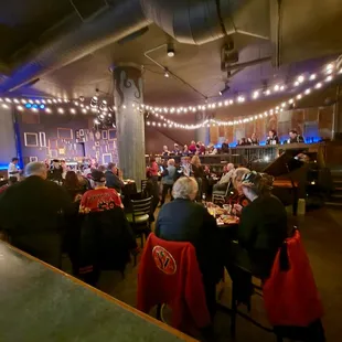 a group of people sitting at a table