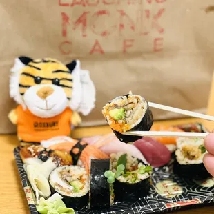 My RCC Tiger  loves sushi  at Laughing Monk Cafe. #lunch