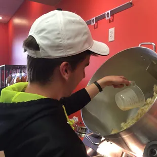 Stephen a.k.a. Scoops tumbling some cheese corn for our Mountain Mix blend.