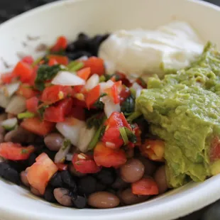 Just a bean and cheese burrito bowl, deluxe + both kinds of beans. Nothing fancy about it, but still solid.