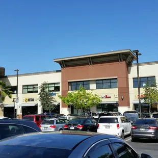 At the 2-story complex: Buffalo Wild Wings, Verizon, Pearl's, Panda Express