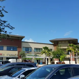 At the 2-story complex:  SuperCuts, UPS Store, Allstate, Russo's, Buffalo Wild Wings,