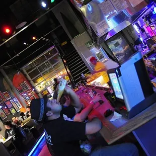 two people sitting at a bar