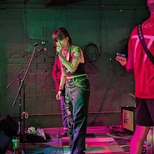 a man and a woman on stage