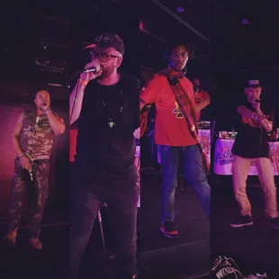 a man singing on stage