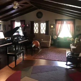 Piano room is filled with pianos!