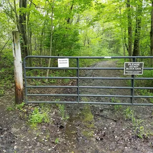 walk around the poles to enter the park