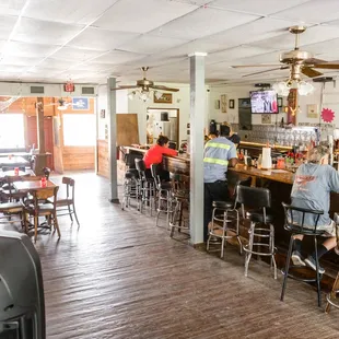 customers sitting at the bar