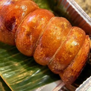 a closeup of a cooked sausage