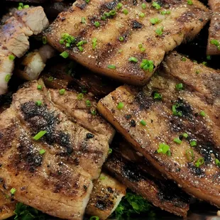 a plate of steak and broccoli