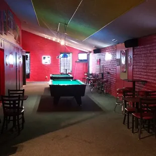 a pool table in a bar