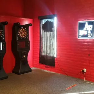 a red room with darts and darts