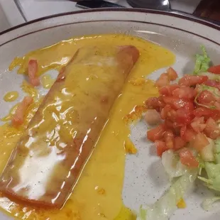 Cheese enchilada with caso...