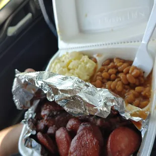 Brisket, sausage, baked beans, and potato salad