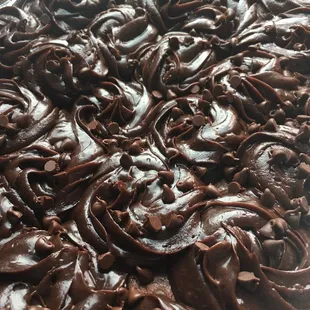 a chocolate cake covered in chocolate icing
